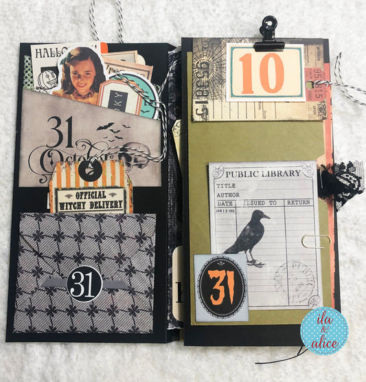 Halloween-themed junk journal page with various elements and a visible brand logo.