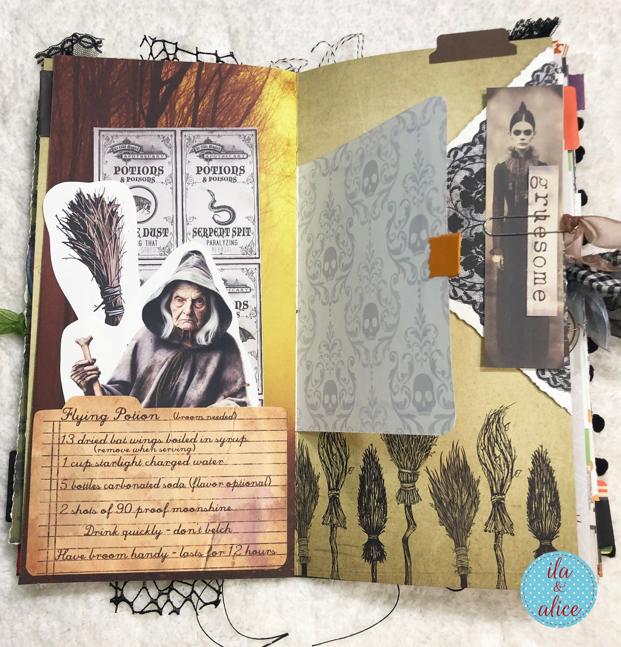 Handmade made Halloween junk journal with witch-themed pages and a broomstick design.