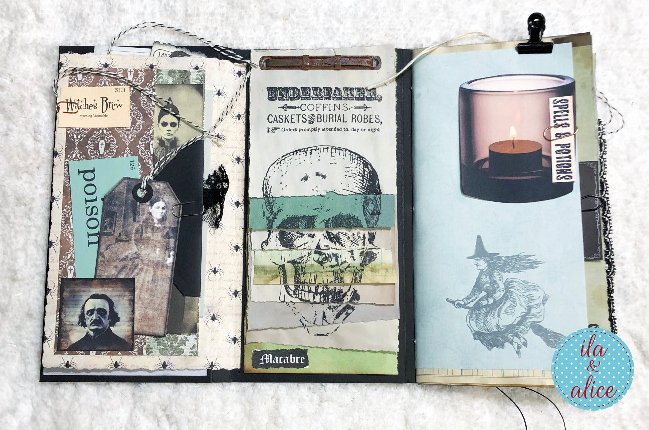 Halloween folio with gothic-themed pages featuring a skull, candle, and other elements.