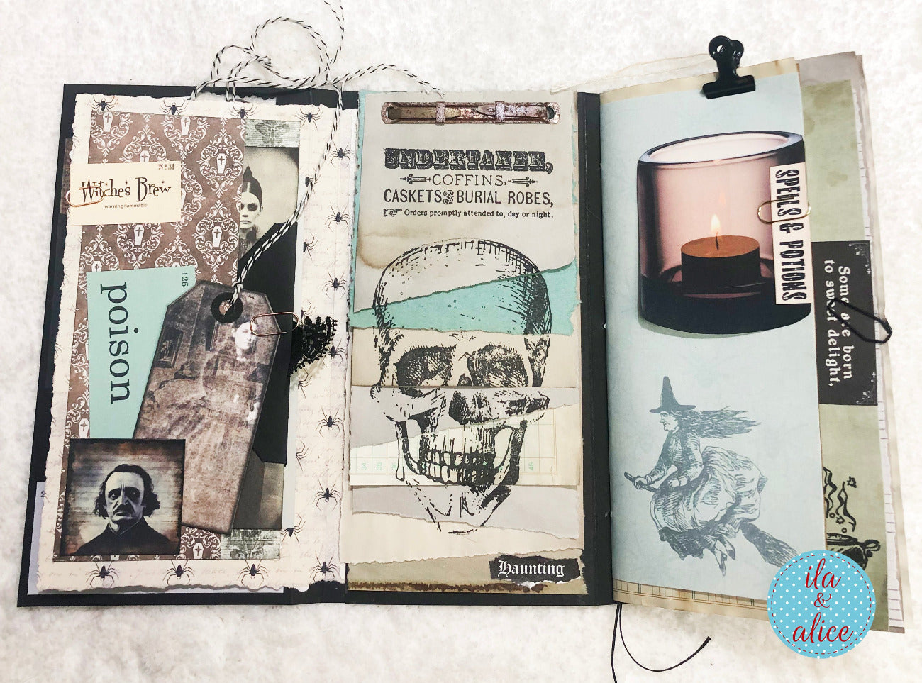 Halloween folio with Halloween-themed pages featuring a skull, candle, and other decorations.