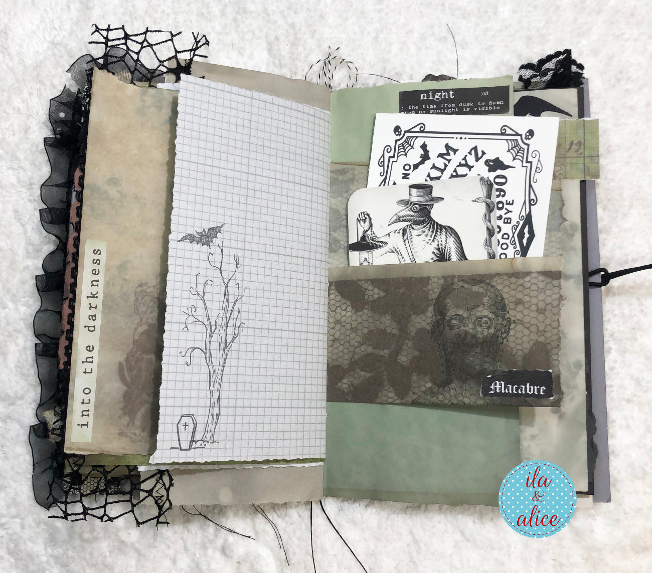 Handmade Halloween junk journal with scary tree, tombstone and plague doctor