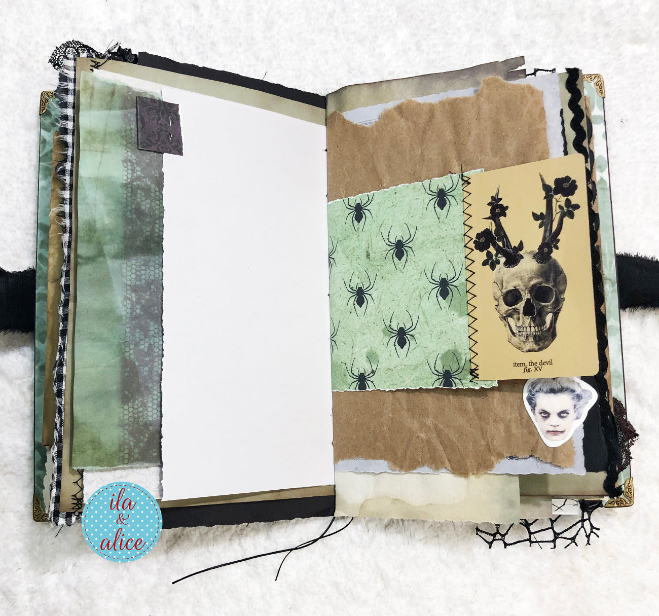 Handmade Eerie Halloween Gothic junk journal with collage of images including a skull and spiders on a textured background.