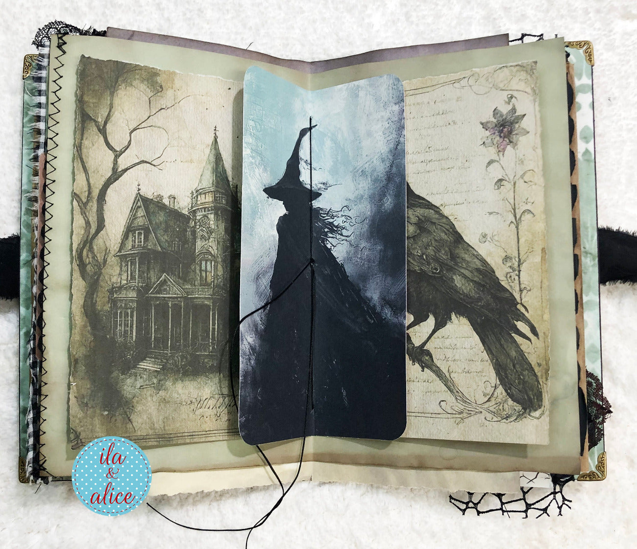 Handmade Eerie Halloween Gothic junk journal with witch silhouette, crow, and haunted house illustration on a white background.