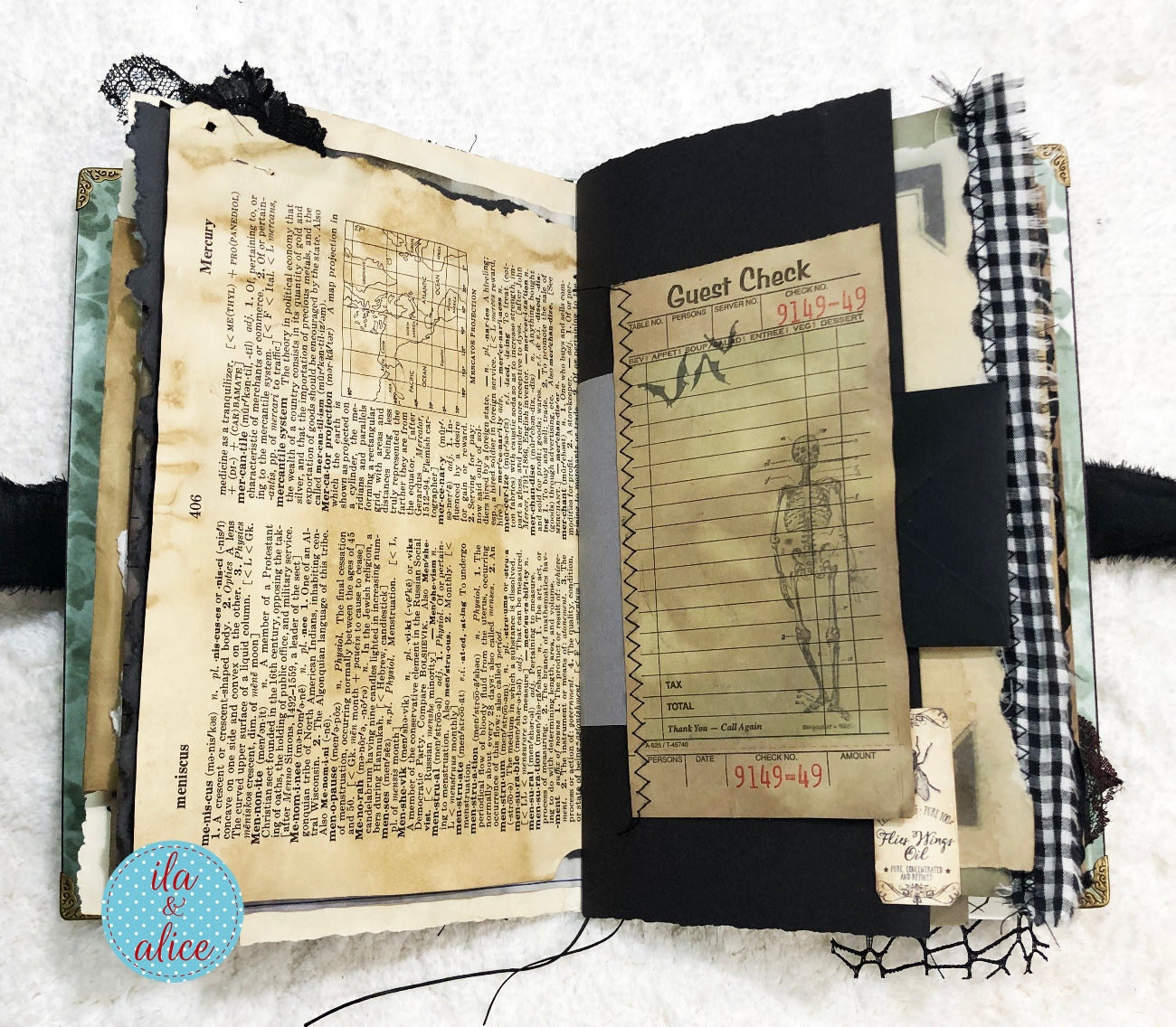 Handmade Eerie Halloween Gothic junk journal with vintage-style pages and decorative elements on a white background