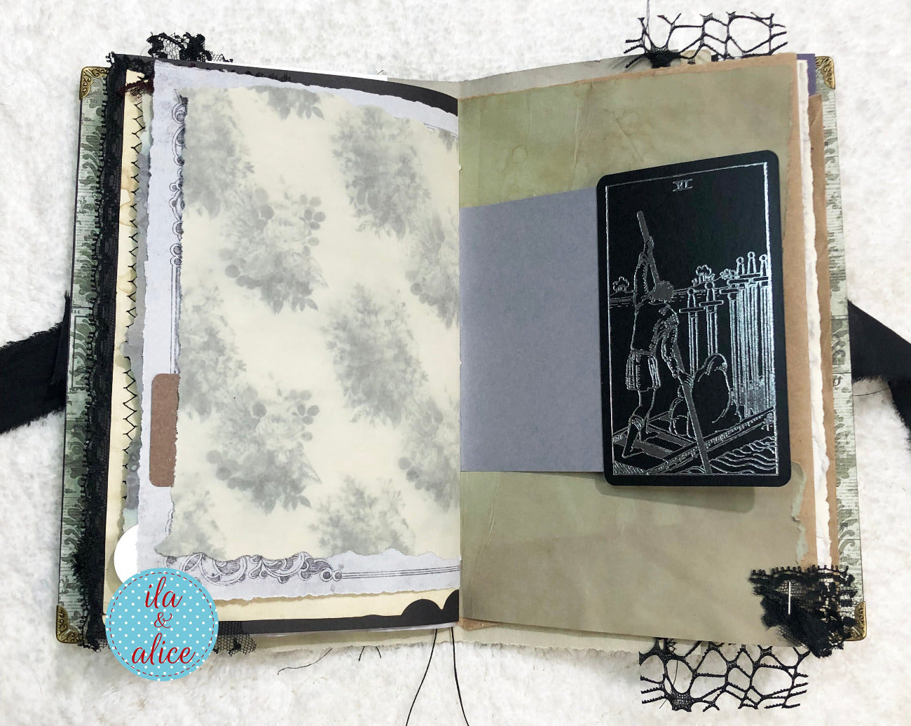 Handmade Eerie Halloween Gothic junk journal with tarot card and coffee dyed paper.