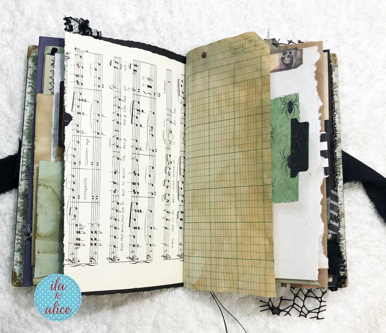 Handmade Eerie Halloween Gothic junk journal with music sheet, grid paper, and Halloween-themed pages on a white background.
