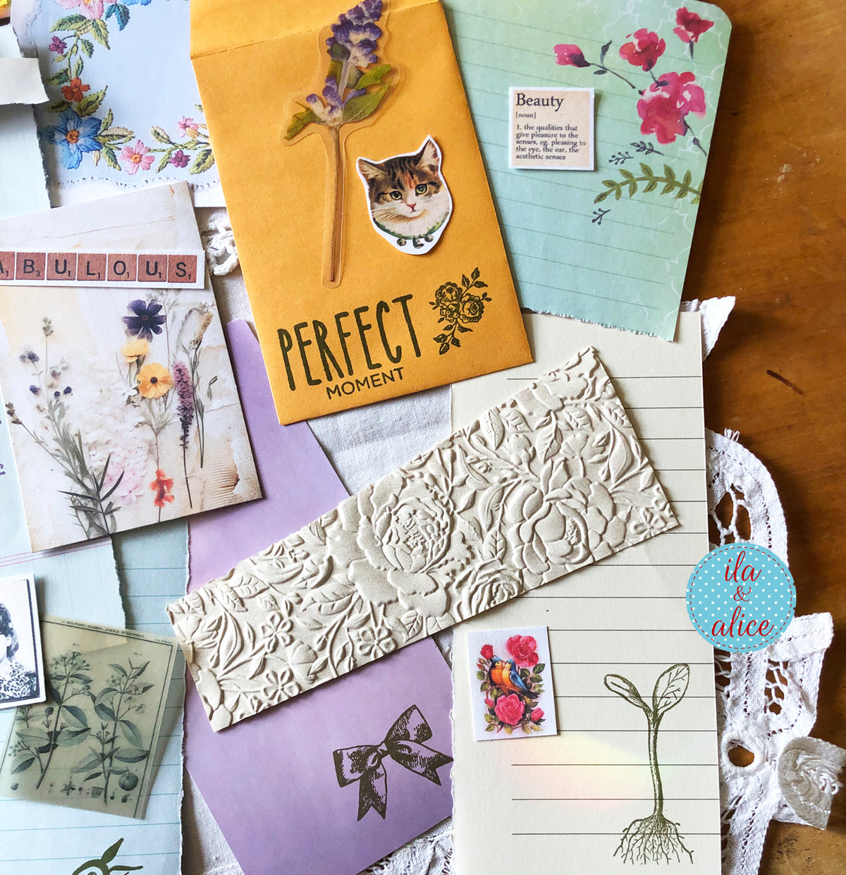Curated junk journal ephemera pack with layered papers, botanical elements, and tuck-able pieces. Vintage pieces of ephemera and vintage book pages included.