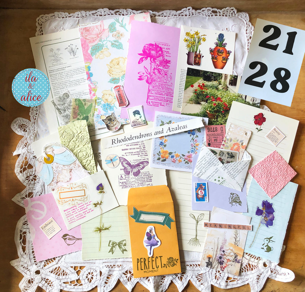 Curated 6x9 junk journal ephemera pack with layered papers, botanical elements, and tuck-able pieces. Vintage pieces of ephemera and vintage book pages included.