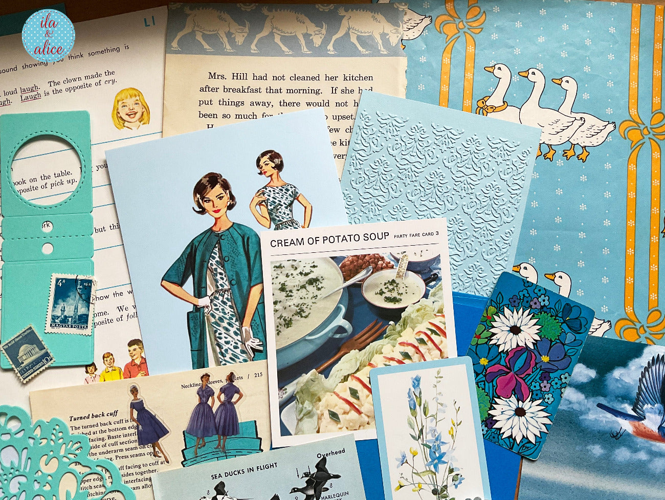 Curated 8x12 junk journal ephemera pack with layered papers, botanical elements, and tuck-able pieces. Blue theme.