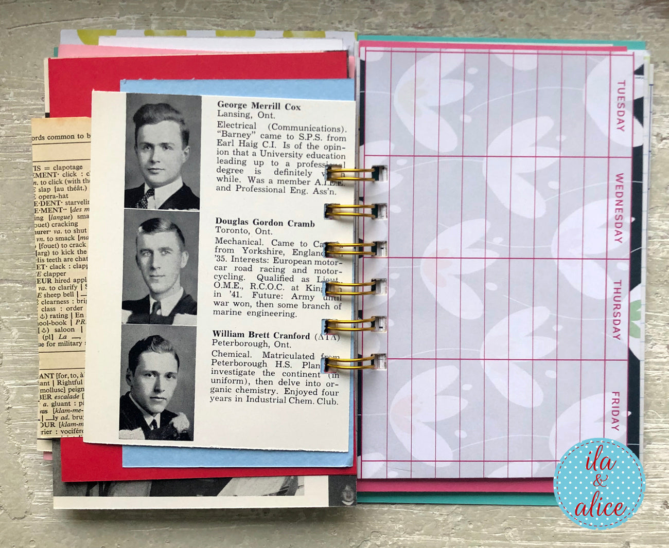 Planner with historical photos and text on a wooden surface