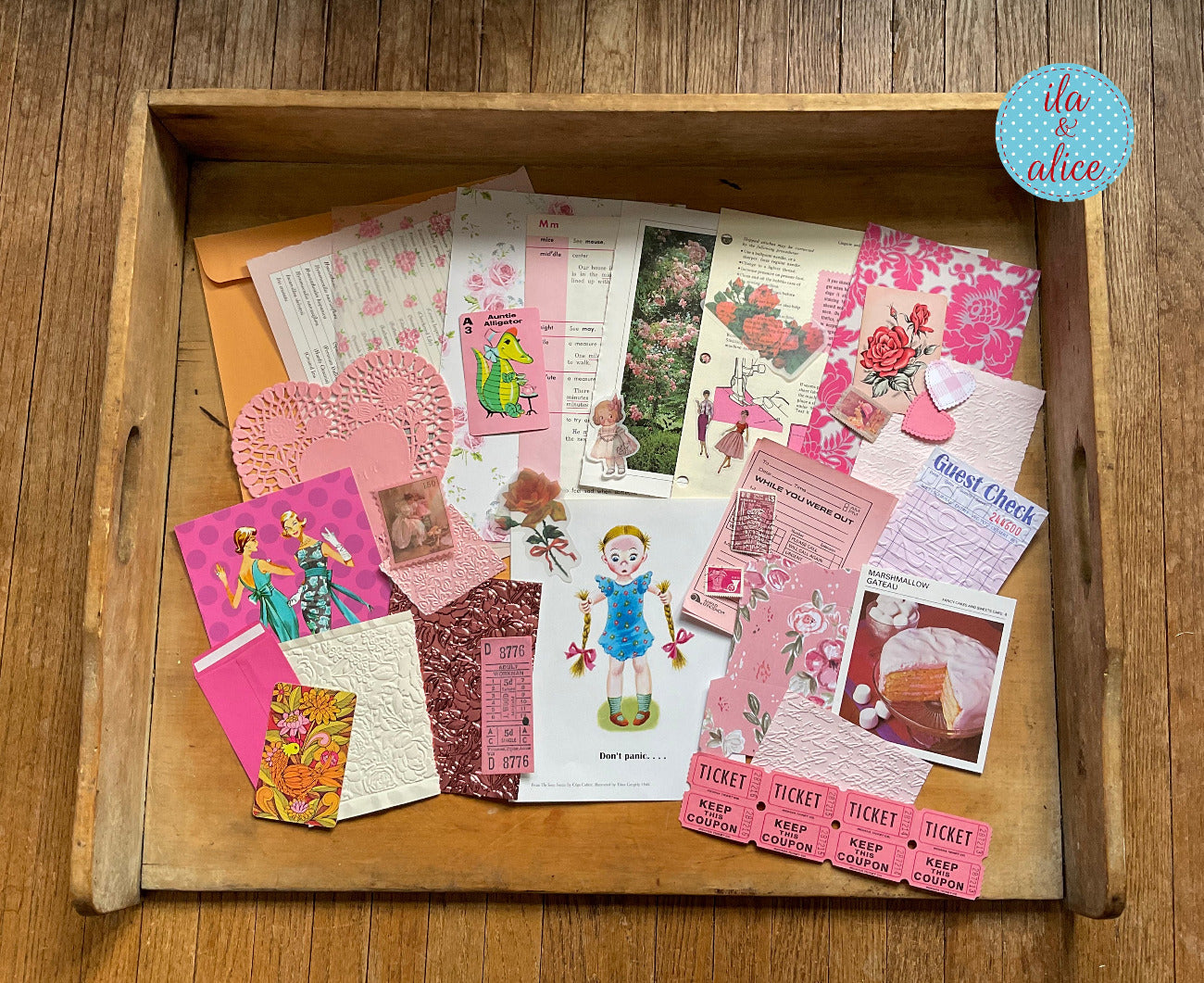 Curated 8x12 junk journal ephemera pack with layered papers, botanical elements, and tuck-able pieces. Pink theme.