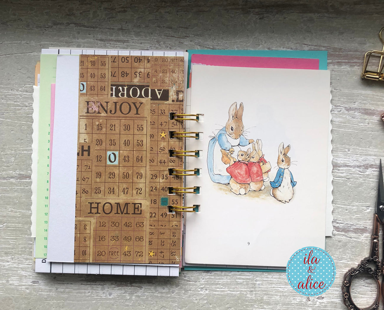 Planner with decorative pages featuring a crossword puzzle and illustrations of bunnies.