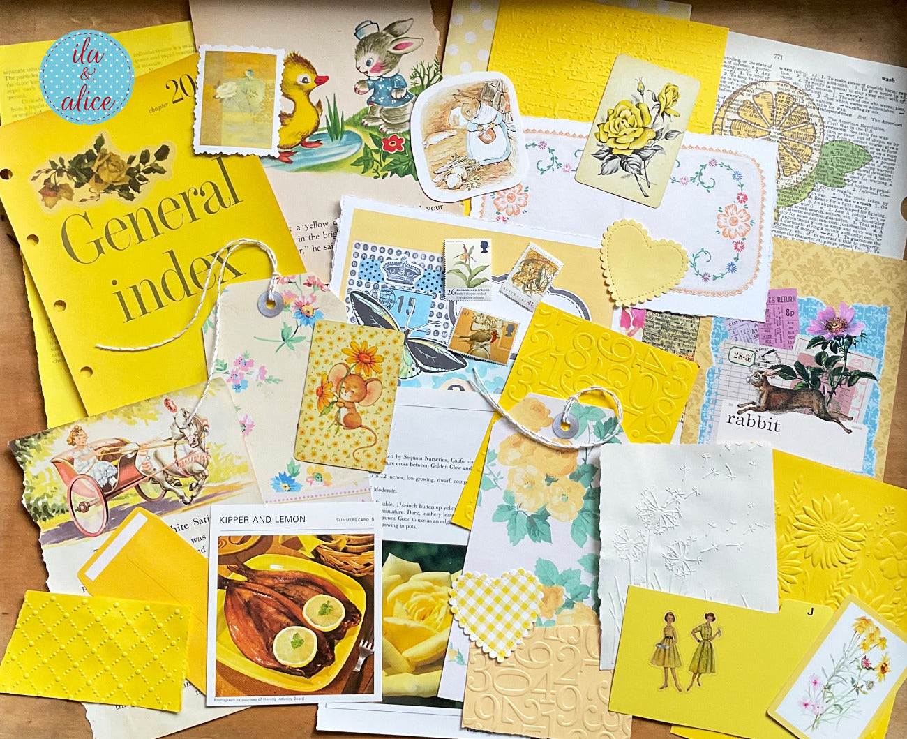 curated 8x12 junk journal ephemera pack with layered papers, botanical elements, and tuckable pieces. yellow theme.