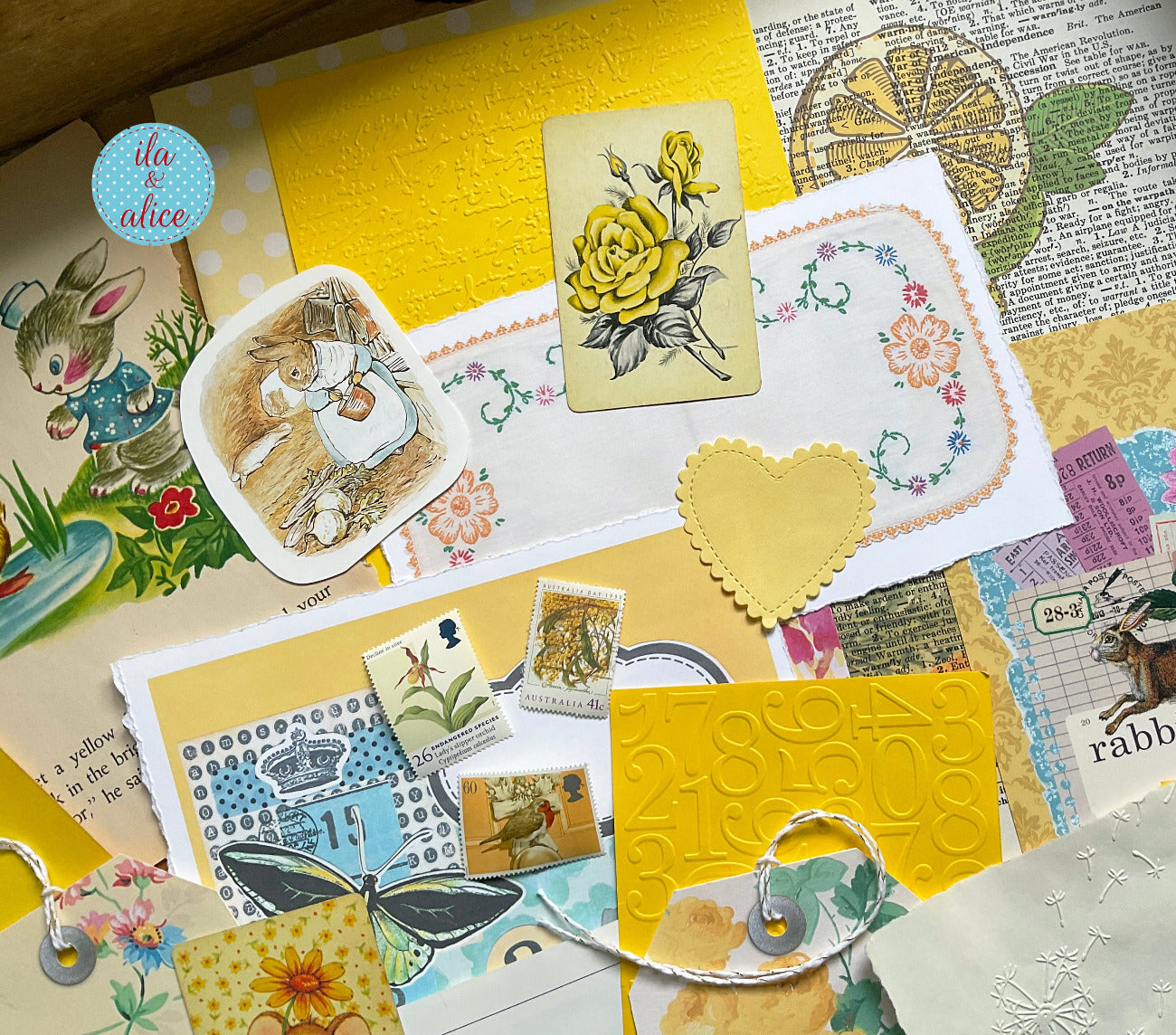 Ccurated 8x12 junk journal ephemera pack with layered papers, botanical elements, and tuckable pieces. yellow theme.